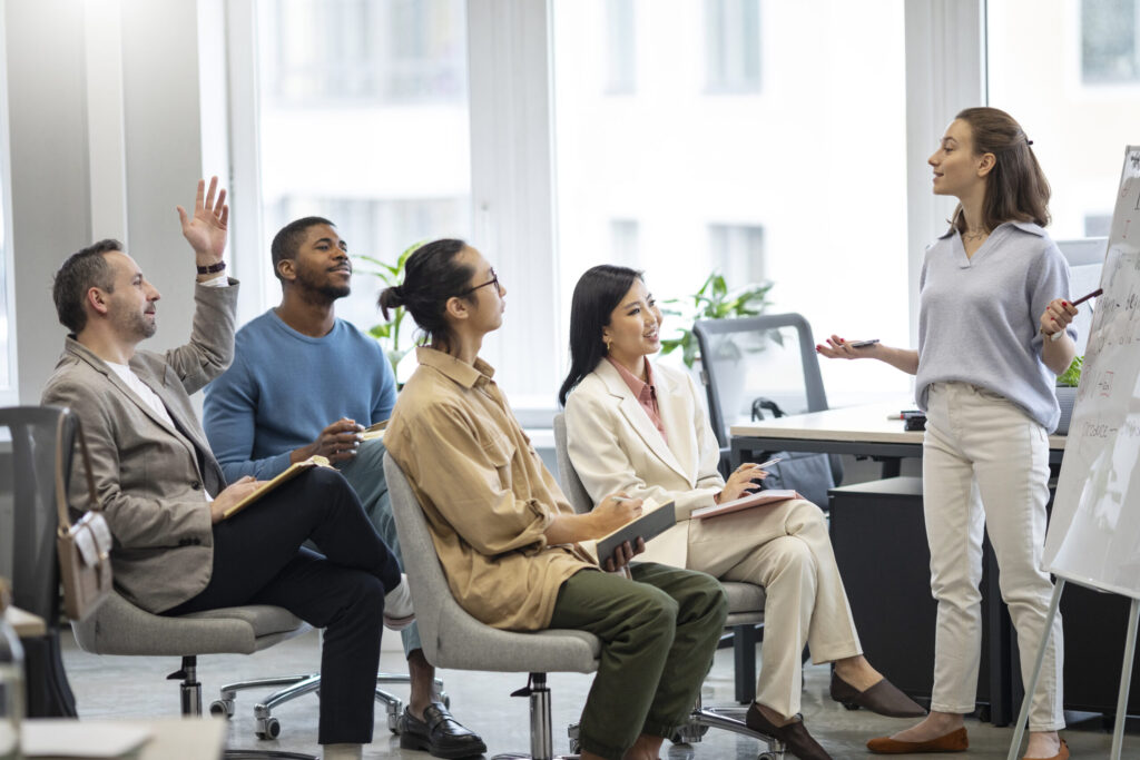people listening to a leadership training