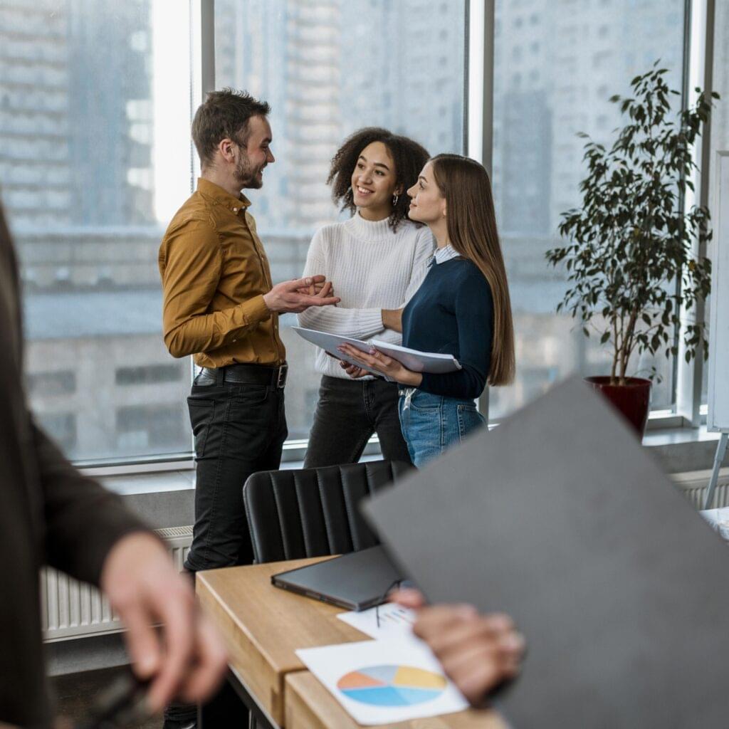 smiley-colleagues-office-meeting image